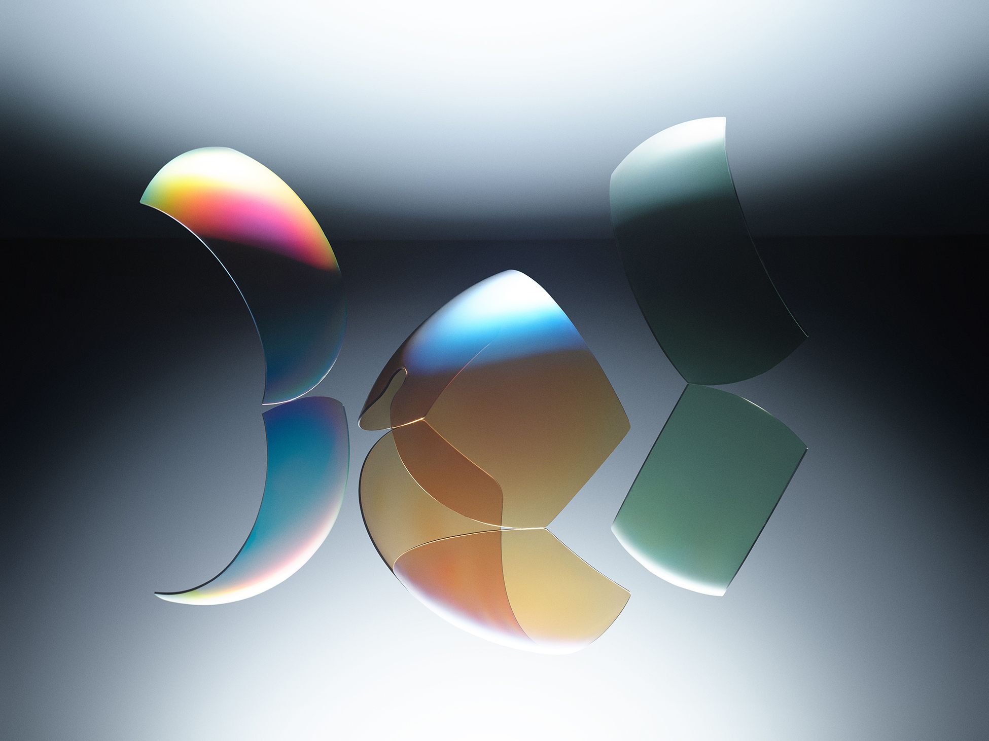 Floating curved NXT® sunglass lens shields with mirror reflections, ideal for high performance.